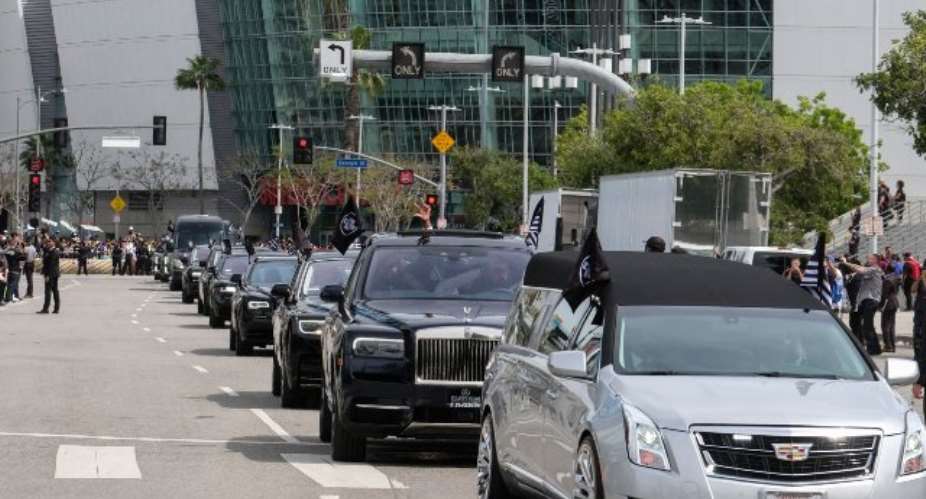 The hearse carrying rapper Nipsey Hussle leaves the Staples Center on Thursday
