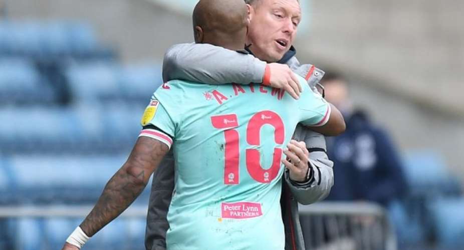 Andre Ayew with Swansea City boss, Steve Cooper