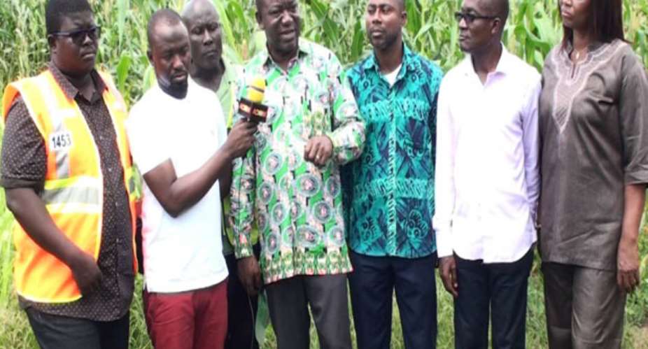 Deputy Minister George Oduro flanked by some staff of MoFA