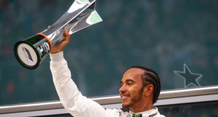 Hamilton Eases To China Win, Ferrari Trips Over On Race Strategy Again