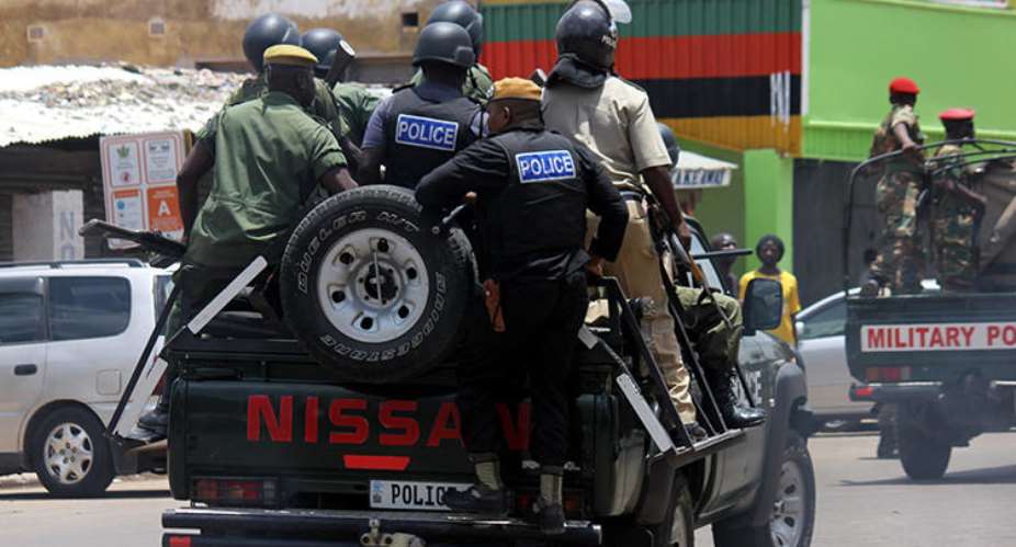 Police Officers Are Seen In The Streets Of Lusaka, Zambia, On January 15, 2018. Zambia Recently Cancelled The License Of The Prime TV Broadcaster And Police Shuttered Its Office--AFPDawood Salim