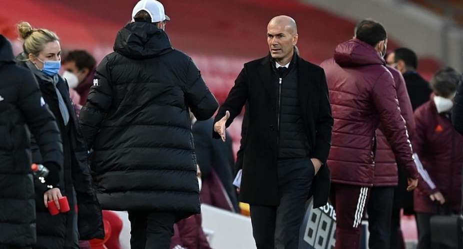 Zinedine Zidane shakes hands with Jurgen Klopp  Getty Images