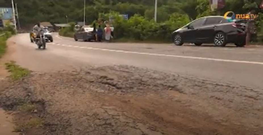 Danger on Adomi Bridge as portions of road develop pothole