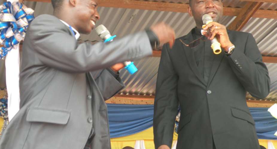 Pastor Joshua (right) during the sermon