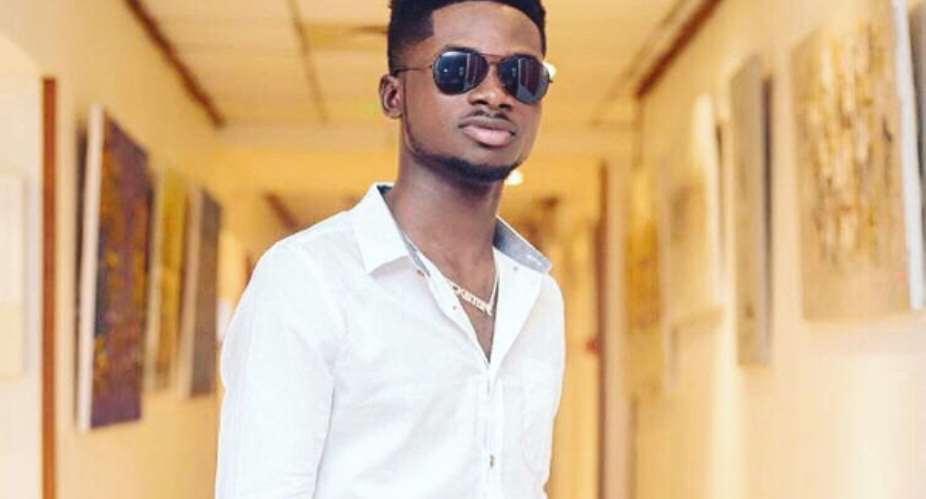 Event Guide Magazine: Kuami Eugene Covers April Edition, Unveiling on April 24