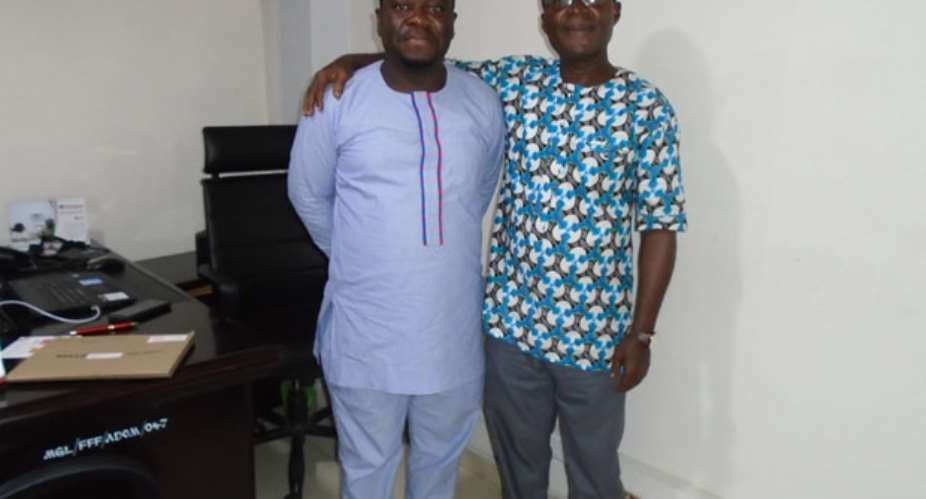 The writer left and Mr. A.C. Ohene