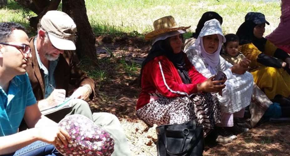 Former Peace Corps Volunteer Mark Apel (second from left) returning to Morocco as a USAID Farmer-to-Farmer Volunteer, advising on agriculture development in the province where he previously served (Photo by Rachid Montassir, 2020).