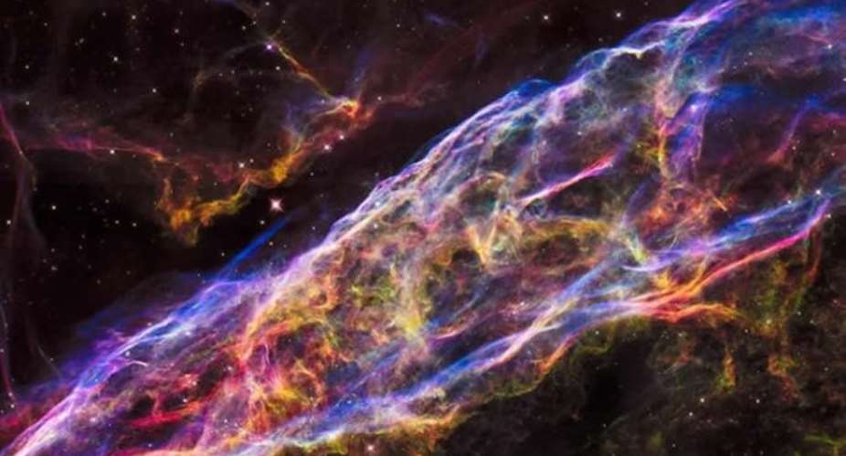 Nasa's Hubble Space Telescope has unveiled in stunning detail a small section of the Veil Nebula - expanding remains of a massive star that exploded about 8,000 years ago