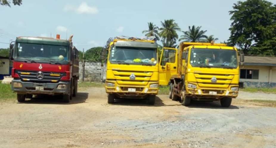 Some of the seized trucks