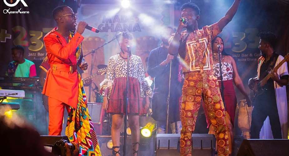 Okyeame Kwame and Kwame Eugene performing on stage at the album launch