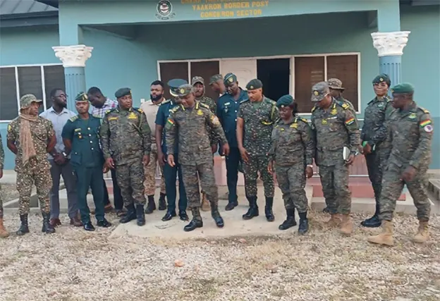 Samuel Basintale Amadu and his team in a group photograph with officers and others at Yaakrom