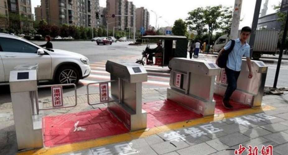 Chinese city installs automatic pedestrian gates to prevent jaywalking