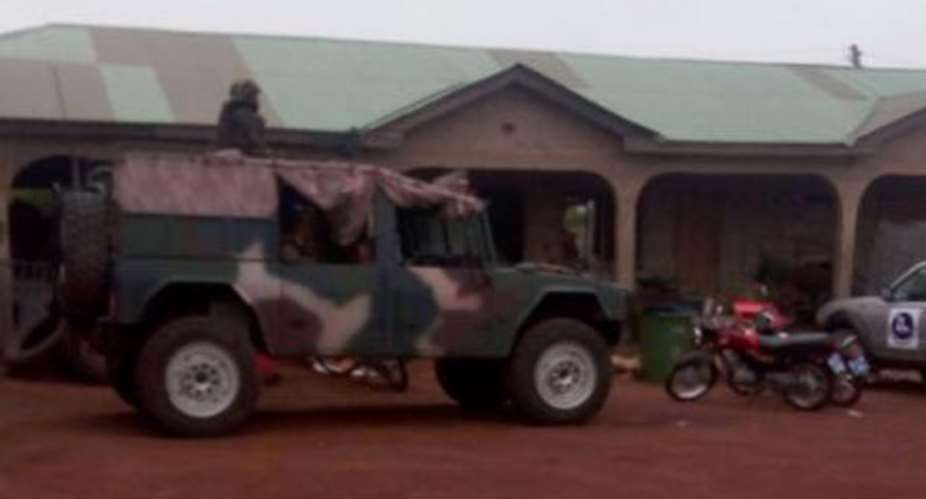Military personnel guarding the Zoomlion offices