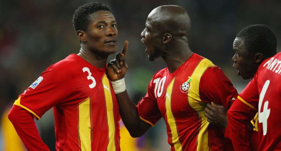 JOHANNESBURG, SOUTH AFRICA - JULY 02: Stephen Appiah of Ghana shouts at team mate Asamoah Gyan after he missed a late penalty during the 2010 FIFA World Cup South Africa Quarter Final match between Uruguay and Ghana at the Soccer City stadium on July 2, 2010 in Johannesburg, South Africa. Photo by Cameron SpencerGetty Images