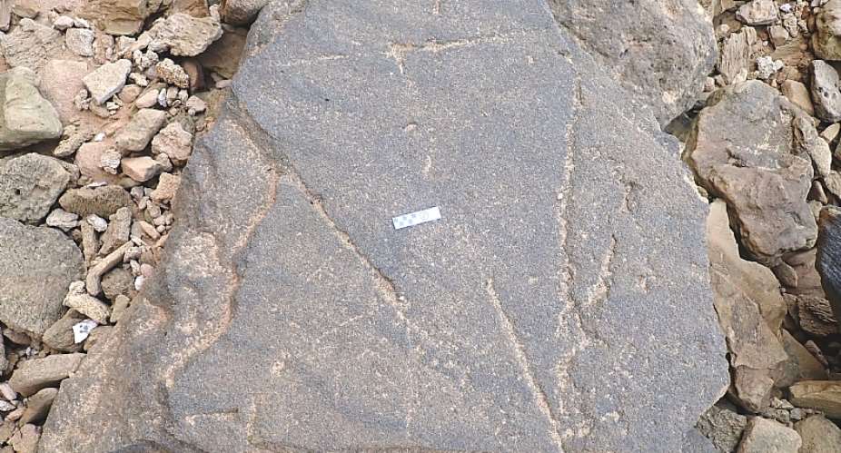 The larger of the two triangular geometric features (scale bar = 10 cm.) - Source: Charles Helm