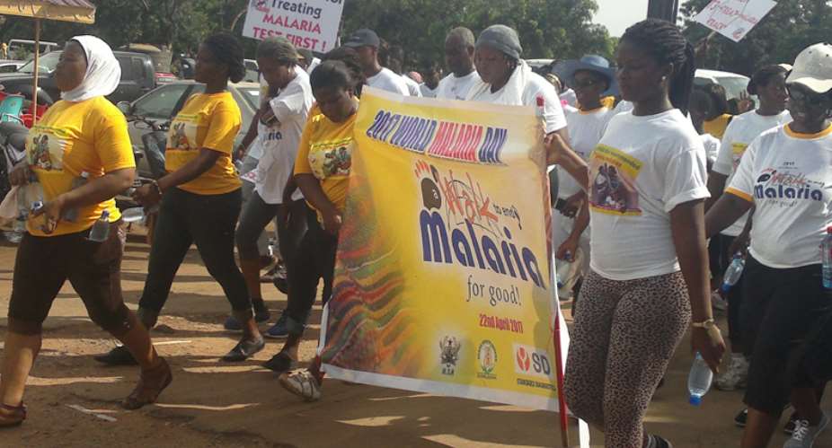 Participants briskly walking to end malaria