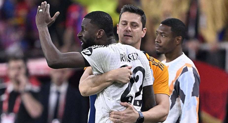 Getty ImagesImage caption: Antonio Rudiger had to be held back by Real coaching staff after being sent off