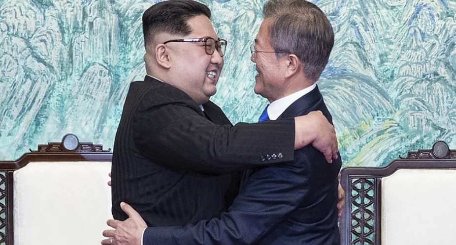 Kim Jong-Un and Moon Jae-in hugging after the meeting AP