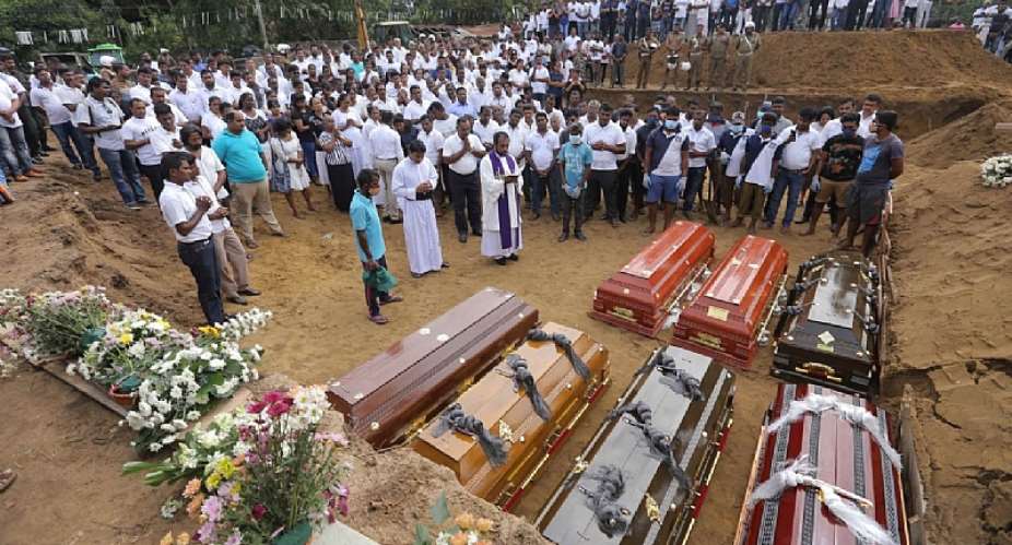 A mass burial on Wednesday for victims of the Easter Sunday bombings in Sri Lanka.