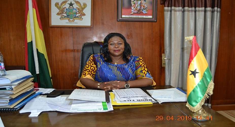 Mrs. Evelyn Richardson Bono Regional Minster working in the office
