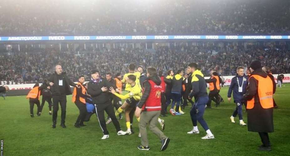 Fans of Trabzonspor stormed the pitch after the full-time whistle