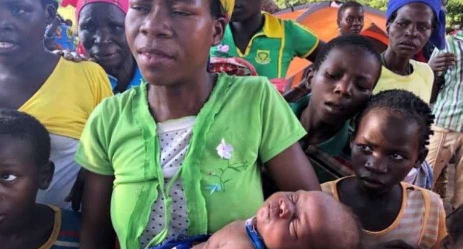 Mozambique Woman Gives Birth Up A Tree