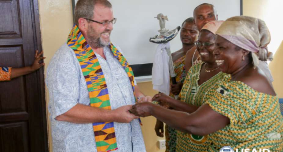 During his trip to the Central and Western Regions, USAIDGhana Mission Director Andy Karas met with fish mongers and processors. Credit: Yooku Ata-Bedu, USAIDGhana