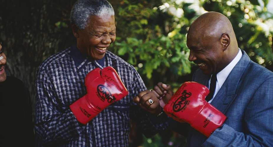Former South African President Nelson Mandela with former American world boxing champion Marvin Hagler. The undated photo was taken after Mandelaamp;39;s release. - Source: Louise GubbGettyImages