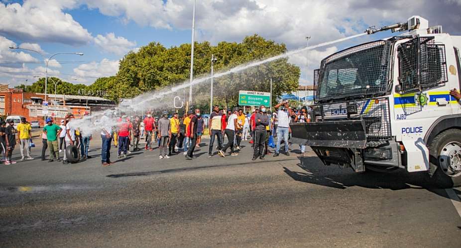 Students protesting over financial exclusion on March 2021 in Johannesburg, South Africa.  - Source: Sharon SeretloGallo Images via GettyImages