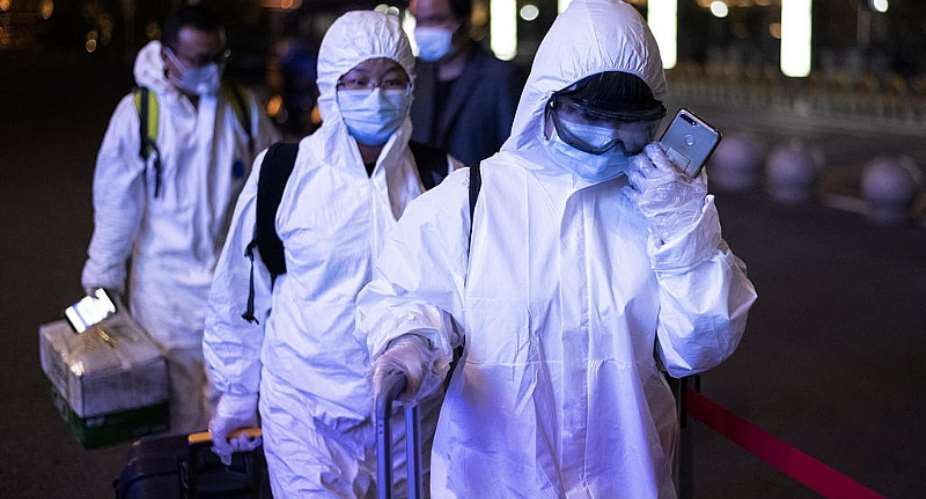 Wuhan emerges from coronavirus lockdown as cases rise in China's north