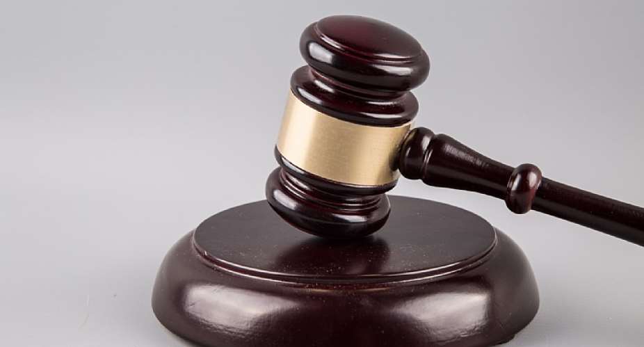 Two remanded over robbery and unlawful possession of military attire