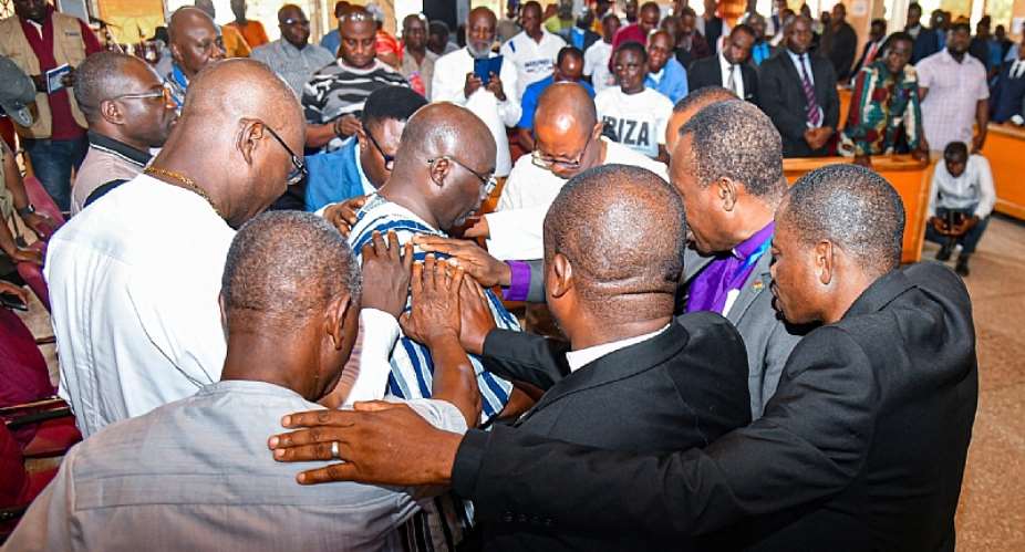 Dr. Mahamudu Bawumia receiving prayers from men of God.