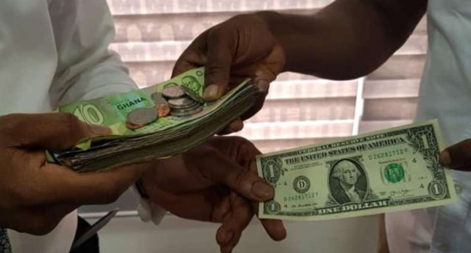 Cedi averages at GHS14.79 per dollar on May Day