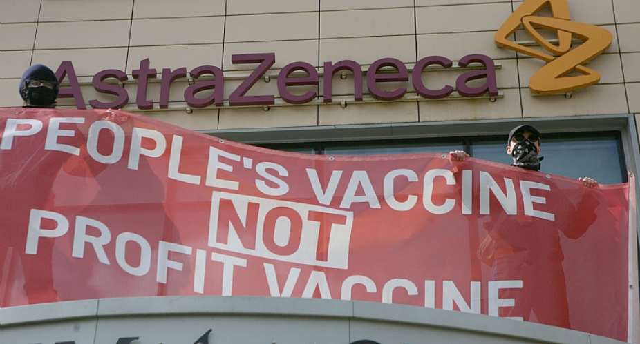 Protesters gather in Cambridge to demanding that AstraZeneca shares blueprints for its COVID-19 vaccine. - Source: Luciana Guerra/PA Images via Getty Images