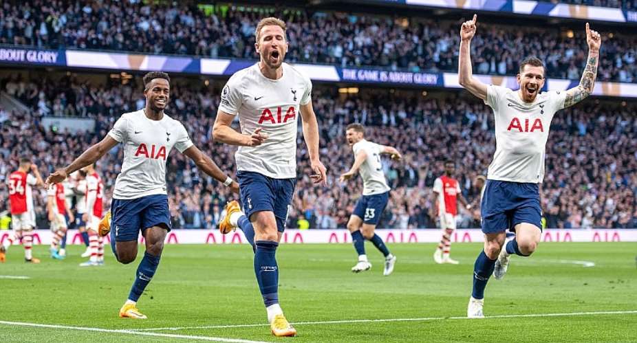 Harry Kane of Tottenham Hotspur celebrates with Pierre-Emile Hojbjerg, Ryan Sessegnon after scoring 2nd goal during the Premier League match between Tottenham Hotspur and Arsenal at Tottenham Hotspur Stadium on May 12, 2022 in London, United Kingdom.Image credit: Getty Images
