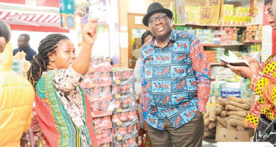 Papa Owusu-Ankomah in a shop