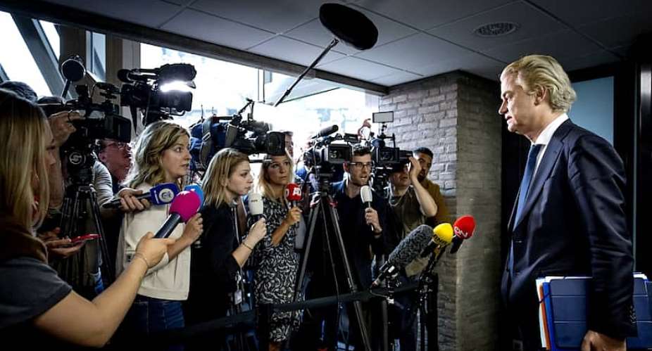 Geert Wilders speaks to the assembled press.
