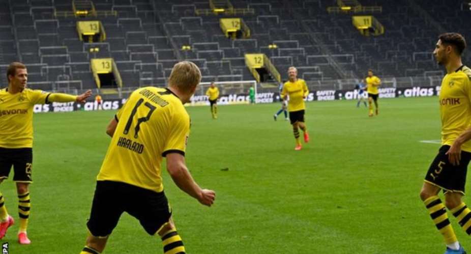 Dortmund players observed social distancing protocol as they celebrated Haaland's goal