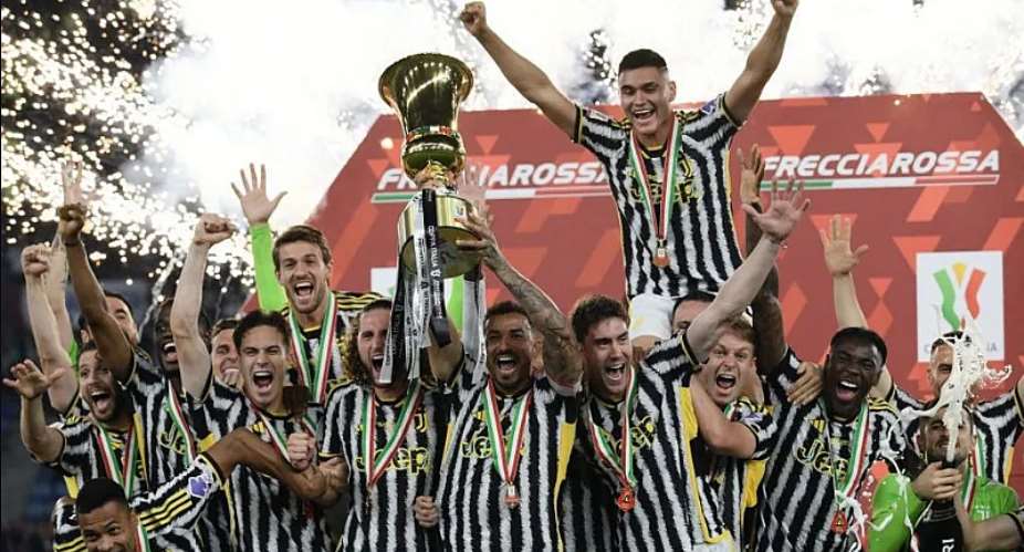 GETTY IMAGESImage caption: Juventus players celebrate winning the Coppa Italia