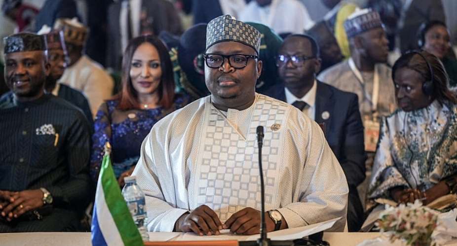 Minister of Foreign Affairs Timothy Kabba, pictured at an Ecowas meeting in Abuja in December 2025, has said Sierra Leone will take in hundreds of West African migrants deported from the US. - AFP - LIGHT ORIYE TAMUNOTONYE