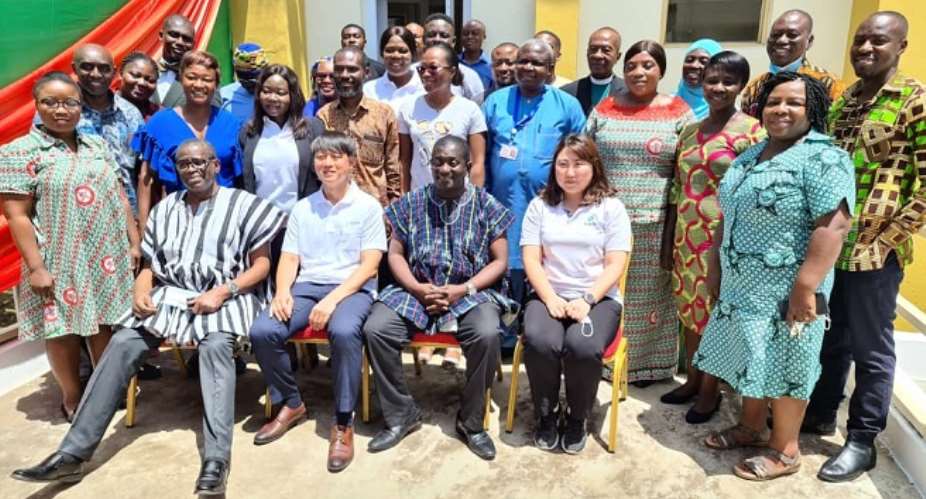 Officials of KOFIH and some KATH staff in a photograph in front of the new Laparoscopic Surgical Training Centre