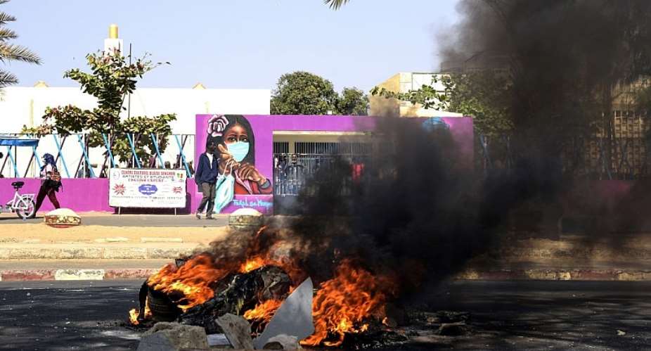 Violent protests in Dakar, Senegal, after opposition leader Ousmane Sonko is arrested on a rape charge.  - Source: Photo by SEYLLOUAFP via Getty Images