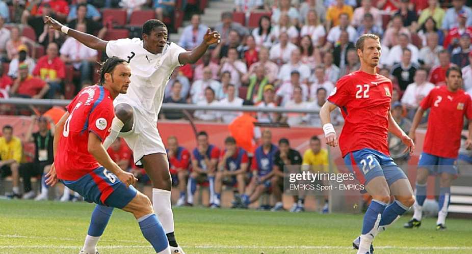 Ghana's Asamoah Gyan second left opens the scoring Photo by EMPICS Sport - PA Images via Getty Images
