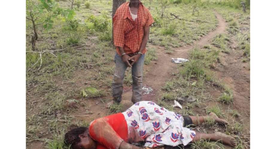 Suspect Yikatey Somatey with the lifeless body of the deceased in the bush at Sawla Tuna