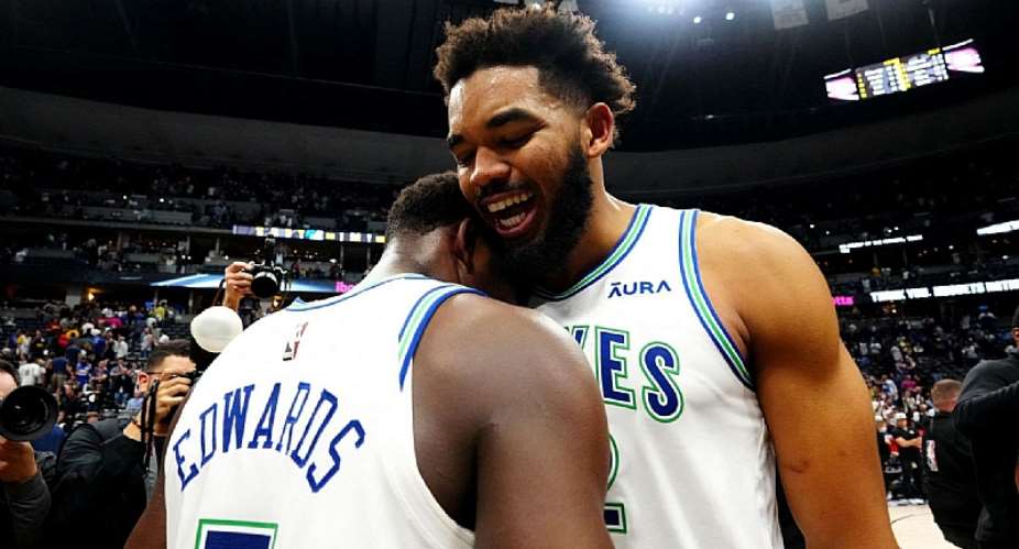 REUTERSImage caption: Karl-Anthony Towns (right) had 12 rebounds to go with his 34 points for Minnesota