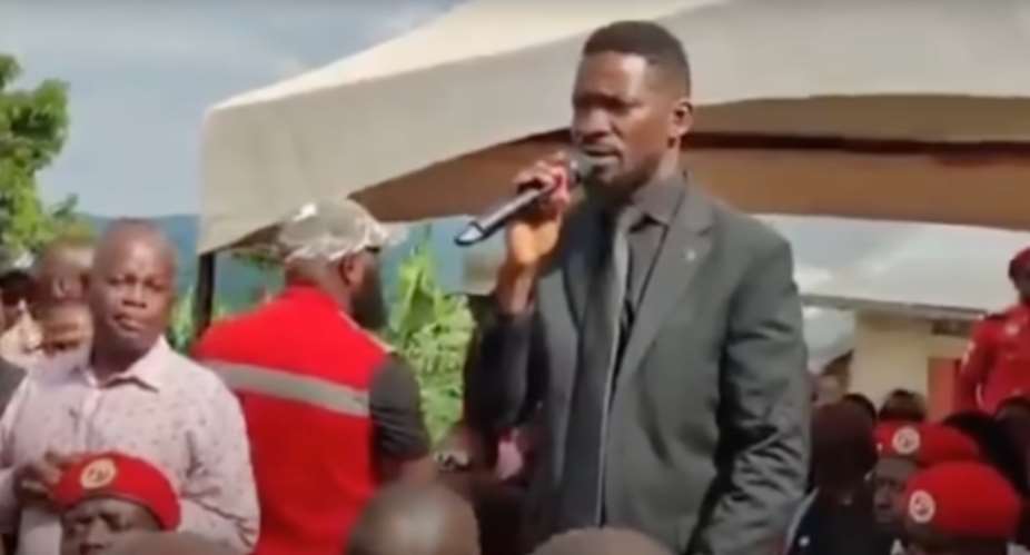 On May 18, Ugandan journalists Zainab Namusaazi, Gertrude Mutyaba, and Magaret Kayondo said that opposition leader Robert Kyagulanyi Ssentamu's private bodyguards harassed and assaulted them while they were covering the funeral of a prominent businessman in the central region district of Lwengo. Kyagulanyi, pictured here, spoke at the funeral. (Screenshot: Daily Monitor/YouTube)