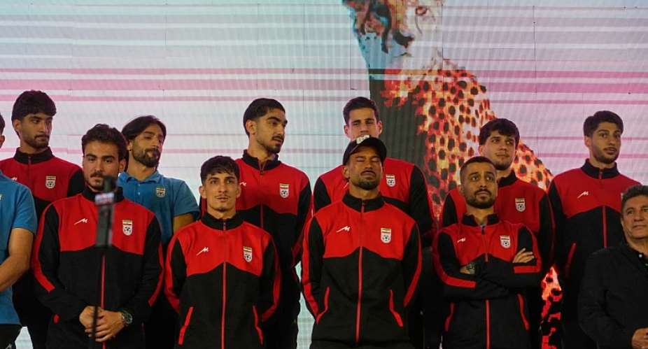 Irans national soccer team players stand onstage as they are greeted by a crowd during a pro-government gathering before their departure for training and friendly matches in Turkey ahead of the World Cup at Islamic Revolution Square in Tehran, Iran, Wednesday, May 13, 2026. (AP Photo/Vahid Salemi)