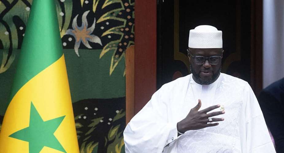 President of the Senegalese National Assembly, Malick Ndiaye, arrives to attend a plenary session on current affairs at the National Assembly in Dakar on February 21, 2025. -  Seyllou, AFP