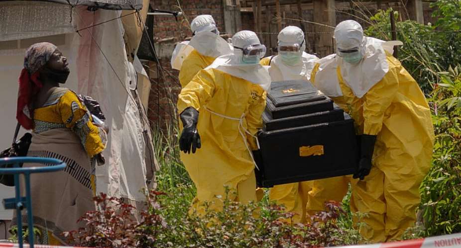A woman cries as Red Cross workers carry the coffin of a person who died of Ebola from a health center in Rwampara, Congo, May 20, 2026. -  Moses Sawasawa, AP