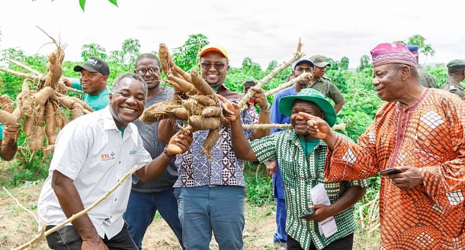 Farmers and researchers celebrating new varieties